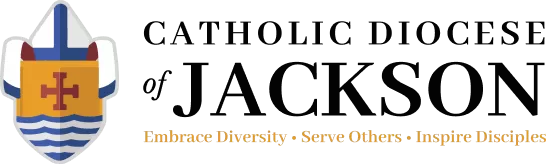 Logo of the Catholic Diocese of Jackson featuring a shield with a cross and waves. Text below reads: Embrace Diversity - Serve Others - Inspire Disciples. Our commitment aligns with the Newman Ministry’s mission to support Catholic colleges in fostering faith and service.