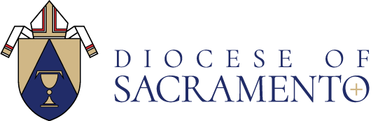 Logo of the Diocese of Sacramento, featuring a shield with a chalice and cloth elements above it, reflecting its deep ties to local Catholic youth groups and ministry colleges.